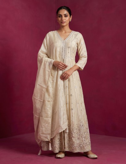 Cream silk front slit salwar suit with embellished dupatta