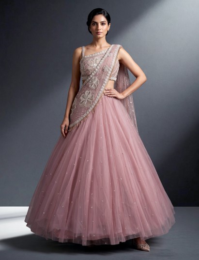 Onion pink embellished net lehenga choli with cape