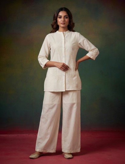 White linen embroidered festive co ord set with palazzo bottoms