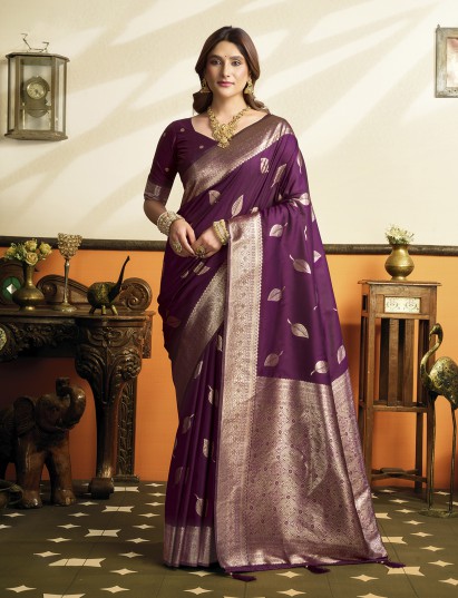 Purple soft silk saree with zari work and pallu tassels