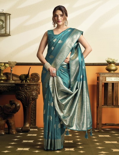 Rama green soft silk saree with zari embellished pallu tassels