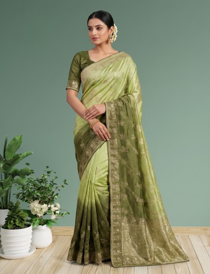 Mehendi green dola silk festive saree with graceful embellishments