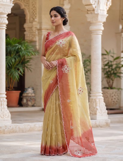 Yellow shaded tissue silk festive saree with graceful handcrafted elegance
