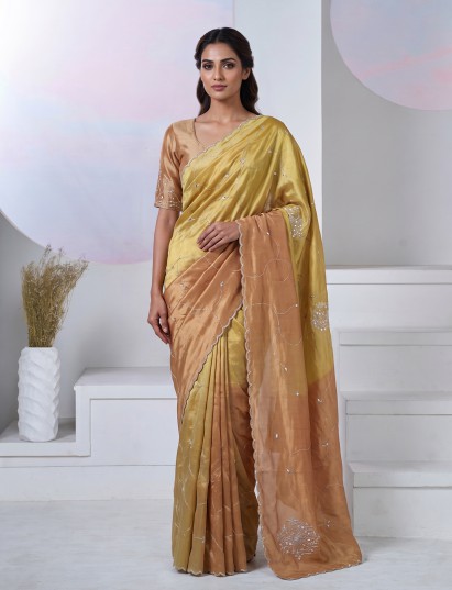 Pastel peach and green tissue silk designer festive saree with elegance