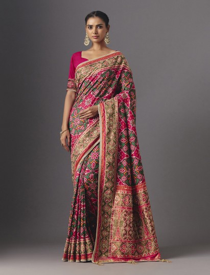 Rani pink art patola silk saree with timeless festive charm
