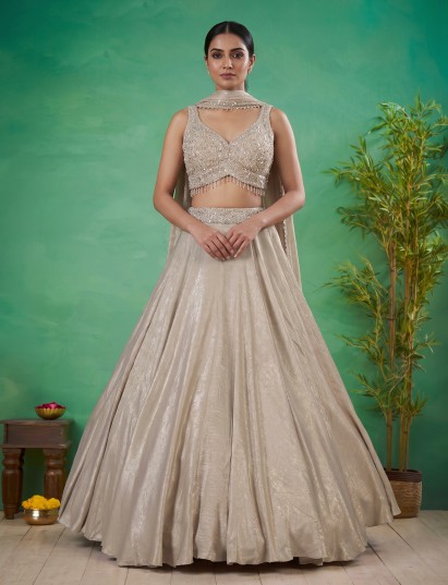 Gold metallic tissue silk wedding lehenga with choker