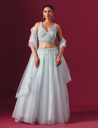 Mint blue net designer lehenga choli with elegant festive drape