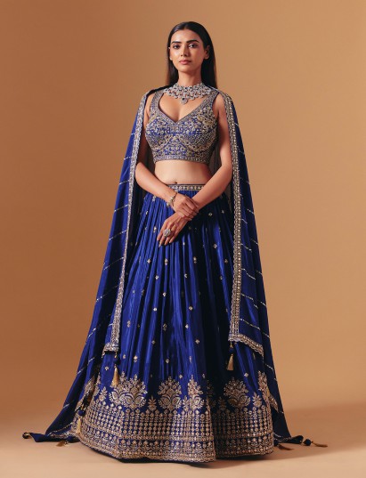Royal blue silk designer lehenga choli with festive embellished dupatta