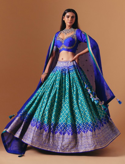 Blue and green silk designer lehenga choli with shaded festive dupatta