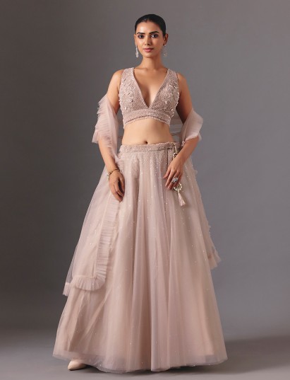 Beige net embroidered designer lehenga choli with graceful festive wear