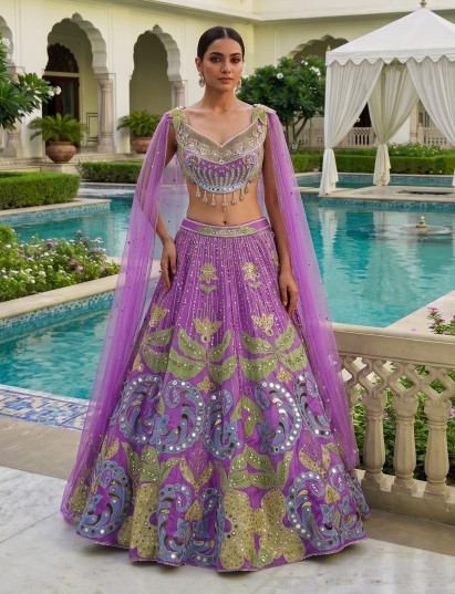 Purple statement cape style embellished silk lehenga choli