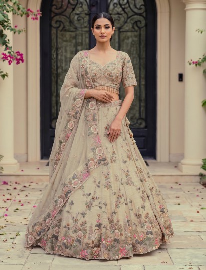 Gold shimmer silk handcrafted festive lehenga ensemble