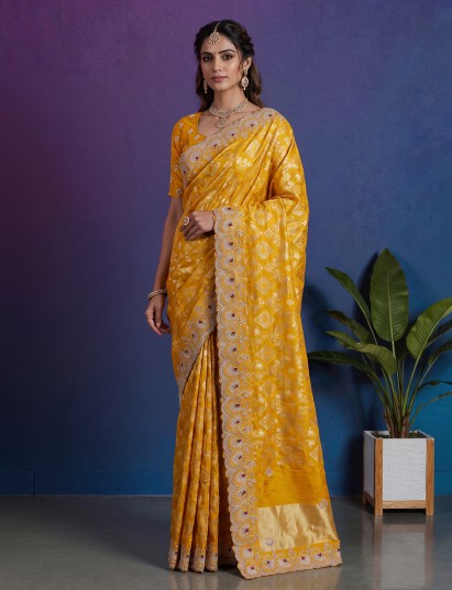 Yellow festive dola silk saree with ornate scalloped embroidery