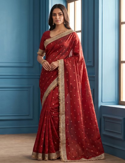 Red regal zari embroidered semi soft tissue saree