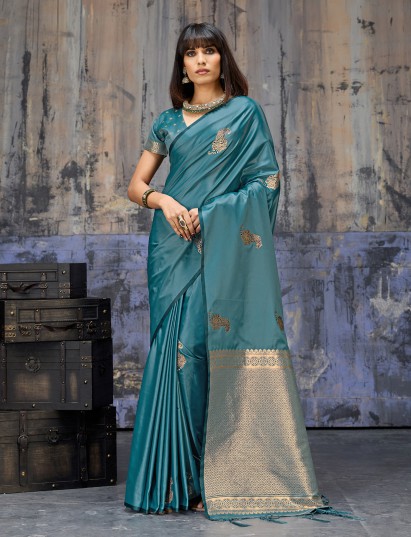 Teal blue luxurious woven festive saree charm