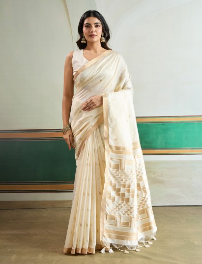 Off white luminous festive silk saree masterpiece