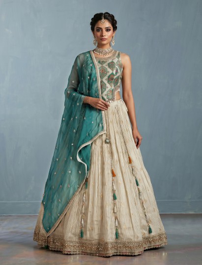 Cream green silk bridal designer lehenga choli with dupatta