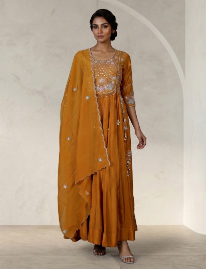 Mustard yellow festive anarkali suit with tassel detailing