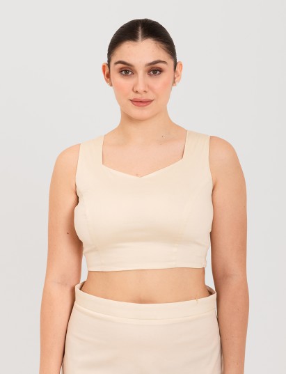 White cotton lycra sweetheart neck sleeveless blouse
