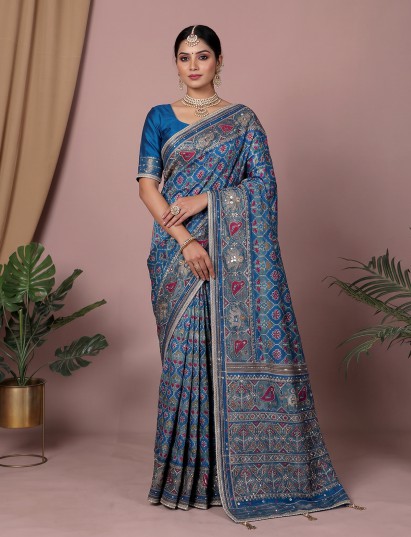 Blue art pattola silk saree with ethnic motifs
