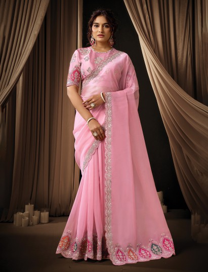 Pink organza tissue saree designed for wedding celebrations