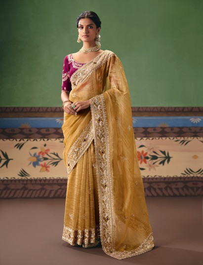 Beige fancy silk saree with contrast blouse