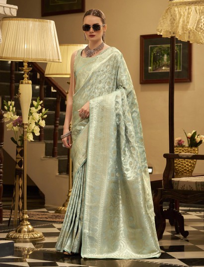 Pista green satin silk saree with zari detailing