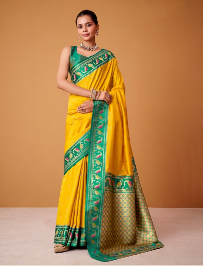 Yellow satin silk saree with bold rama green border