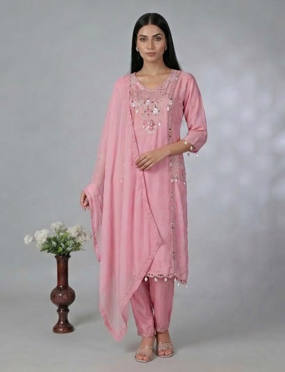 Pink silk festive salwar suit with coin and cowrie embellishments