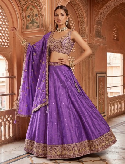 Violet silk lehenga choli with embroidered festive design