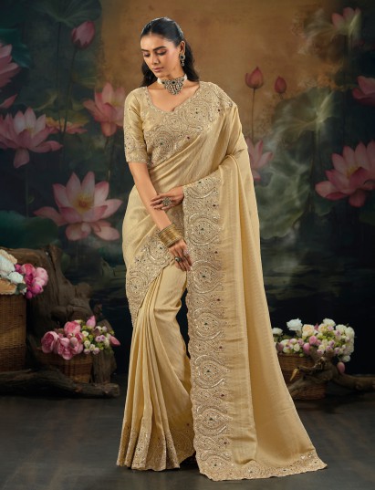 Beige kanjivaram saree with rich embellished border