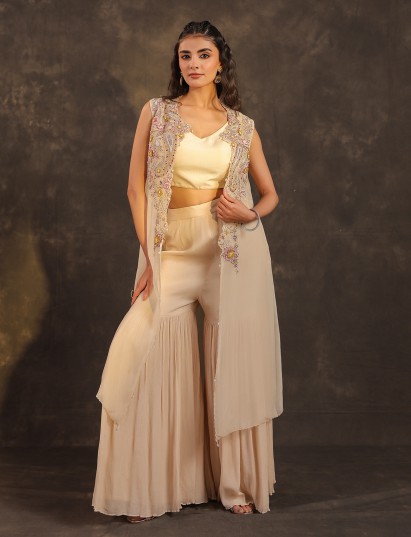 Beige chinon jacket style sharara suit with pearl embellishments