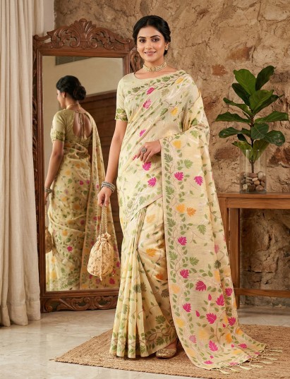 Cream linen cotton saree with colorful motifs