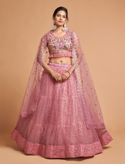 Pink wedding wear lehenga choli in soft net