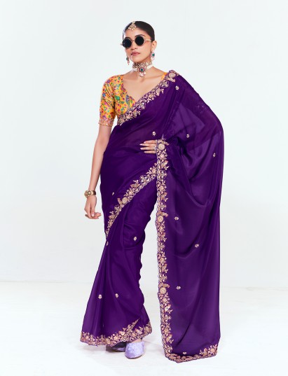 Purple tissue saree with stylish contrast blouse