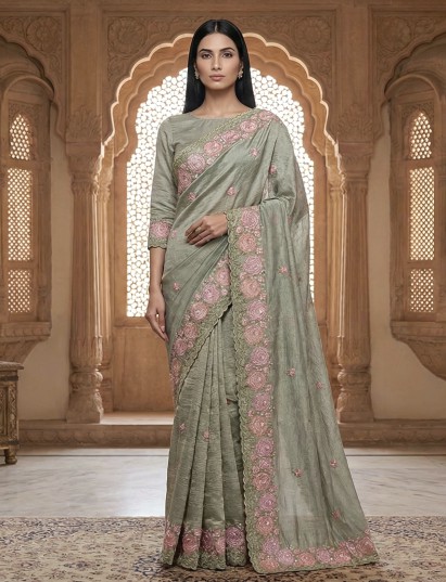 Pastel green cruss tissue festive saree grace