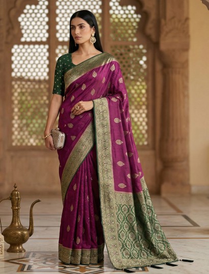 Purple dola silk saree with bold green border