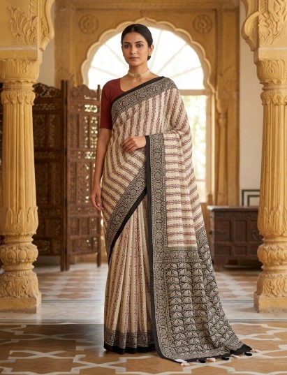 Beige muslin saree with elegant prints