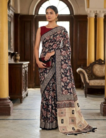 Black muslin saree featuring ethnic prints