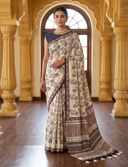 Off white muslin saree with delicate prints