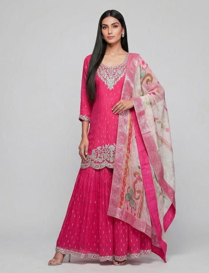 Rani pink silk sharara suit with contrast dupatta