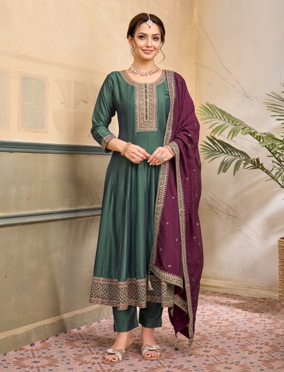 Pastel green silk anarkali festive embellished suit
