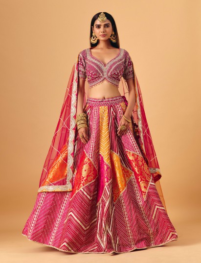Magenta silk lehenga choli with zardosi and sequin embellishments