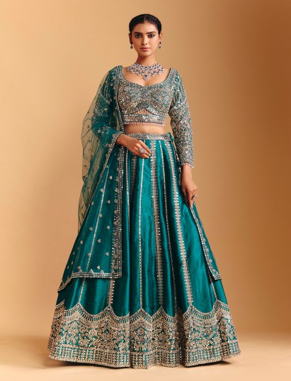 Rama green raw silk lehenga choli with mirror elegance