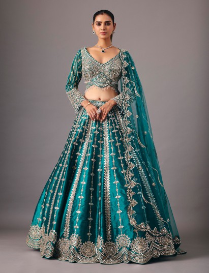 Peacock green raw silk lehenga choli with mirror accents