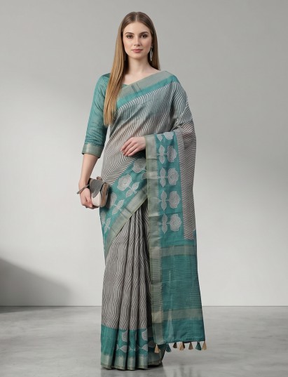 Beige and green art tusser silk saree designed for festive wear