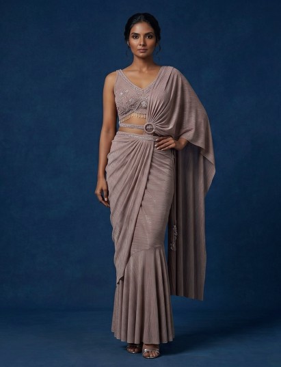 Onion pink shimmer georgette saree with embellished blouse and belt