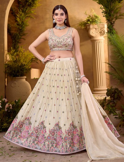 Cream silk lehenga choli with classic zardosi detailing