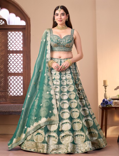 Pastel green silk lehenga choli with floral motifs