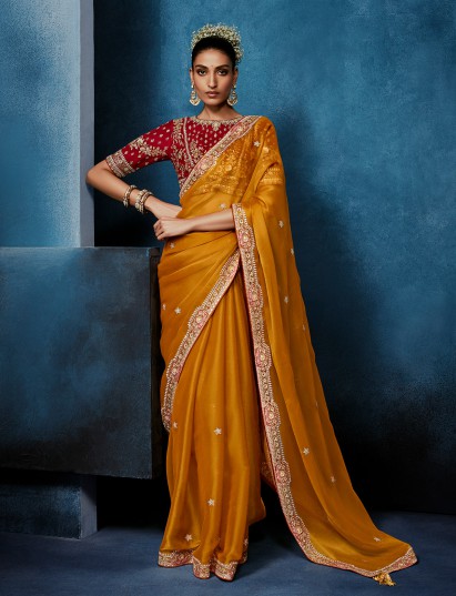 Mustard yellow tissue silk saree for wedding celebrations